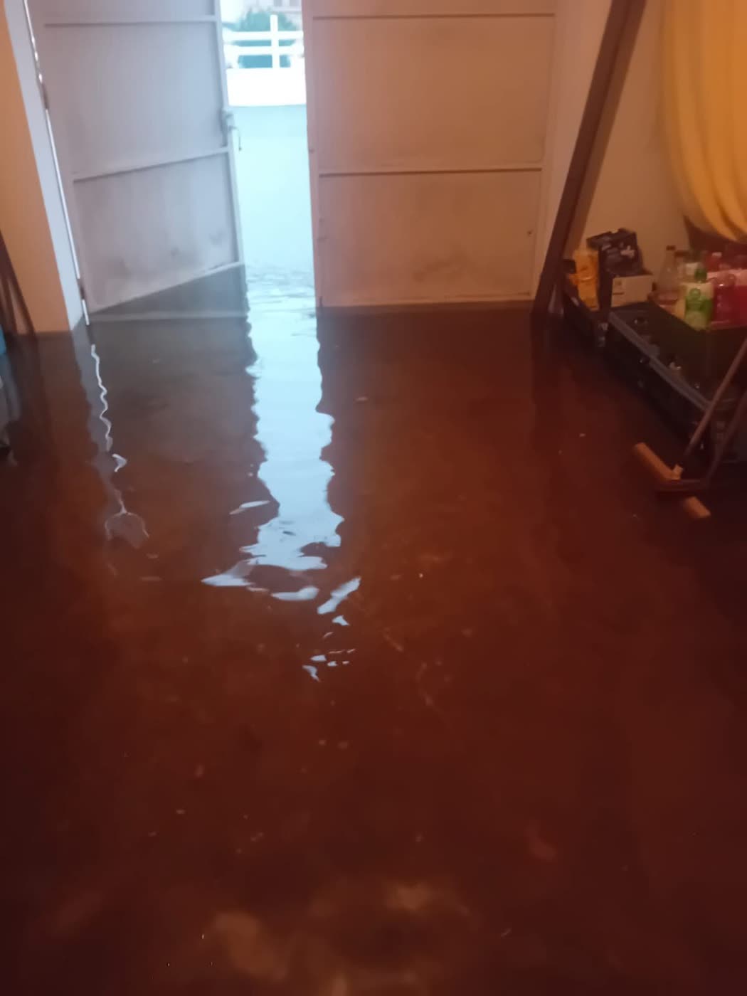 Eau entrée dans le garage par la porte, rue des Violettes, 15 août 2026